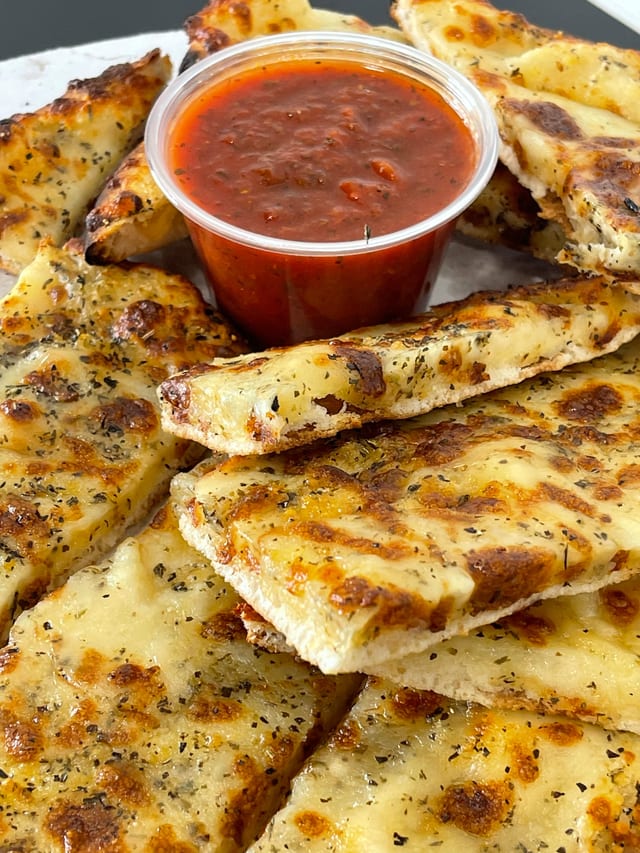 Fire-Kissed Cheese Stix.